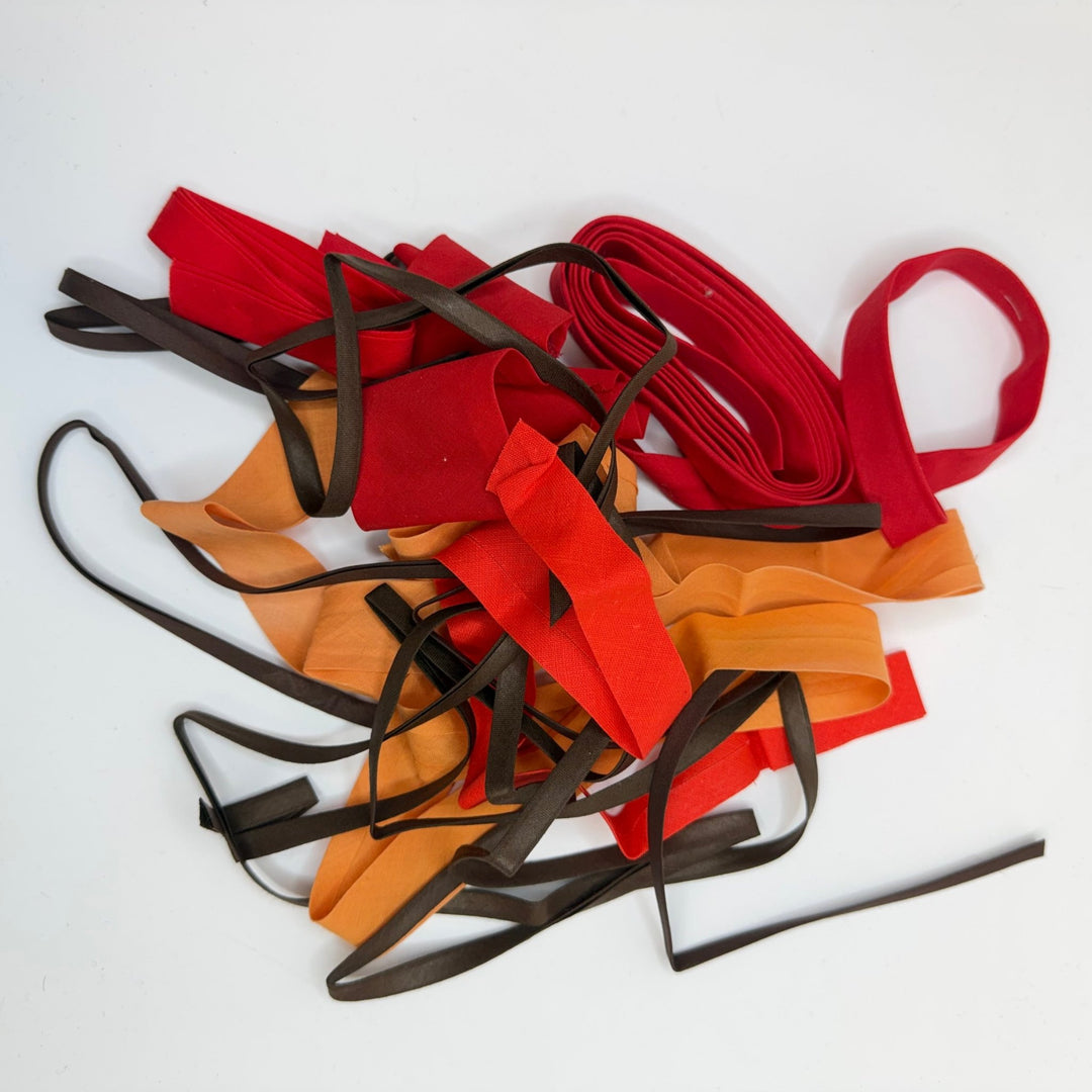 ¼" Double Fold Woven Bias Tape - Red Orange Brown - 1M Package - True Deadstock supplies Fabric by private - Sustainable Textile | FABCYCLE