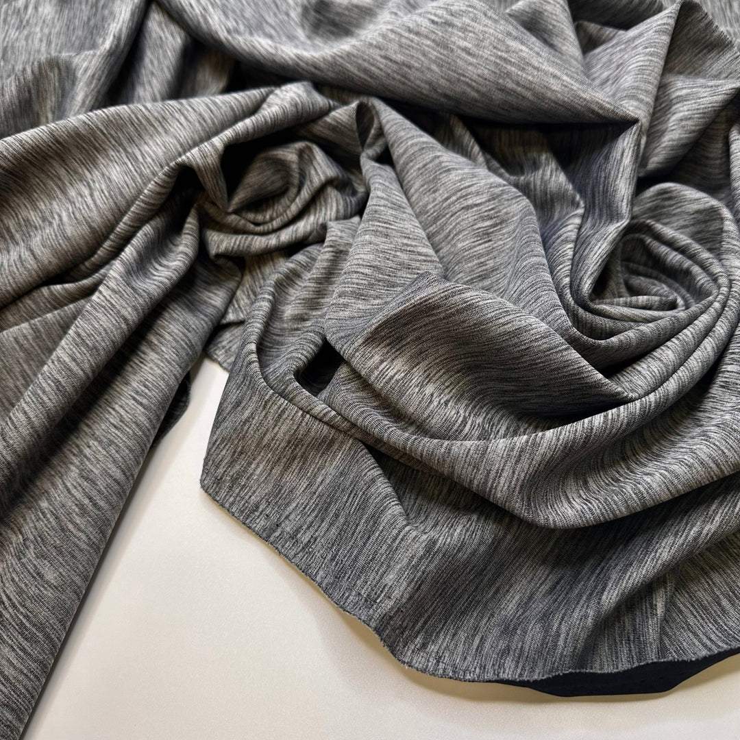 Downy Woodpecker - Fused Double Sport Knit Poly Knit - Black/Grey Heathered - 1M Bundle - True Deadstock fabric Fabric by private - Sustainable Textile | FABCYCLE