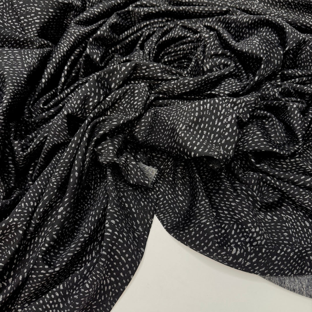 Endlessly Adjusting Needle Tension - Rib Knit Poly/Rayon Knit - Black/Grey Abstract - 3.3M Bundle - True Deadstock fabric Fabric by private - Sustainable Textile | FABCYCLE