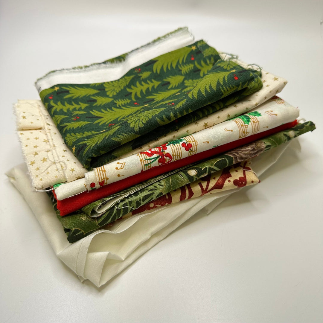 Evergreen Quilting Pack - Cotton Blend Woven - Green/Cream Christmas Prints - 7 piece pack - True Deadstock fabric Fabric by private - Sustainable Textile | FABCYCLE