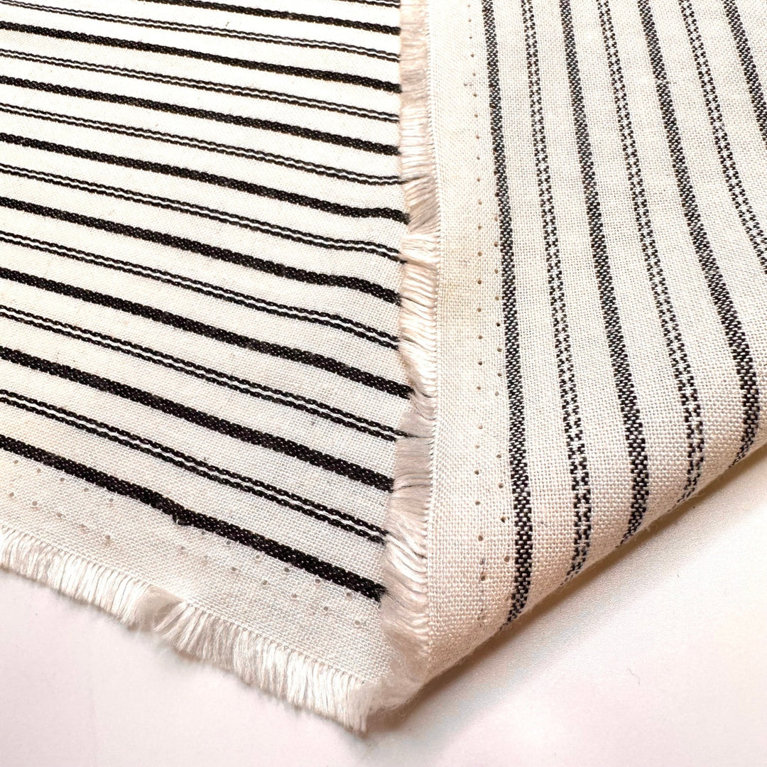 Exuding Confidence - Cotton Blend Woven - Light Cream/Black Pinstripe - 3.2M Bundle - True Deadstock fabric Fabric by private - Sustainable Textile | FABCYCLE
