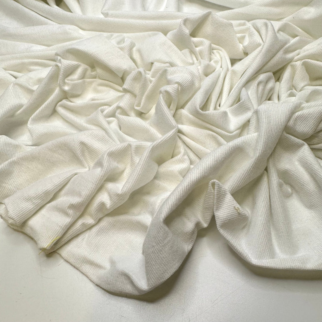 Finding A Comfortable Wedding Dress - Polyester Blend Knit - White - 2M Bundle - True Deadstock fabric Fabric by private - Sustainable Textile | FABCYCLE