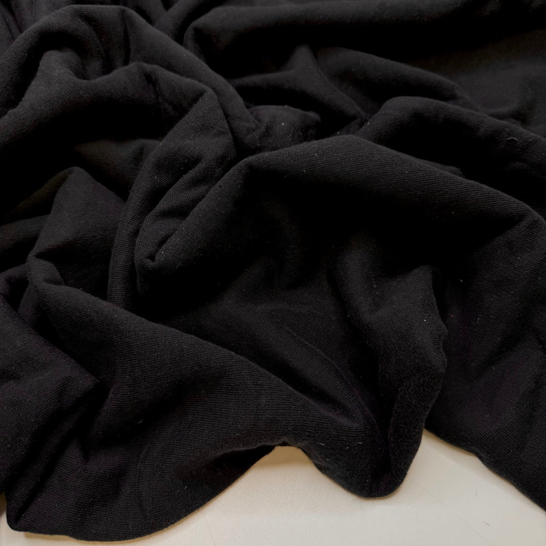 Finding Fungi - Tubular Jersey Fleece Cotton Blend Knit - Black - 0.95M Bundle - True Deadstock fabric Fabric by private - Sustainable Textile | FABCYCLE