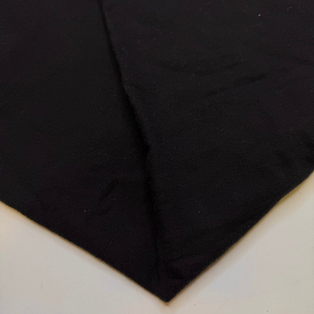 Finding Fungi - Tubular Jersey Fleece Cotton Blend Knit - Black - 0.95M Bundle - True Deadstock fabric Fabric by private - Sustainable Textile | FABCYCLE