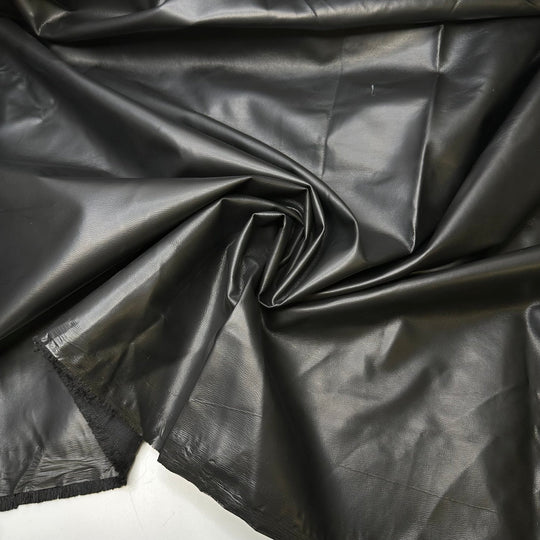 Garbage Bag Couture - Water Resistant Faux Suede Poly/PU Woven - Black - 2.3M Bundle - True Deadstock fabric Fabric by private - Sustainable Textile | FABCYCLE