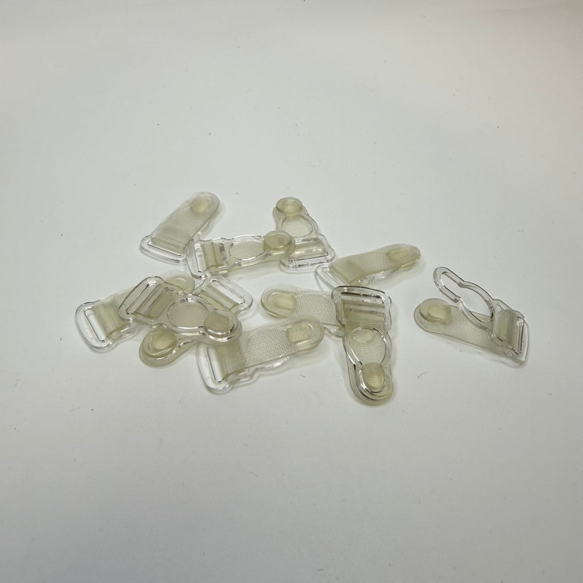 Garter Clip Notions - Clear - Individual - True Deadstock supplies Fabric by private - Sustainable Textile | FABCYCLE