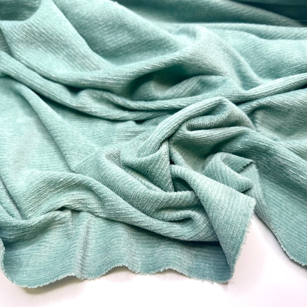 Ghouls Just Want To Have Fun - Corduroy Poly Woven - Light Green/Blue - 1.6M Bundle - True Deadstock fabric Fabric by private - Sustainable Textile | FABCYCLE