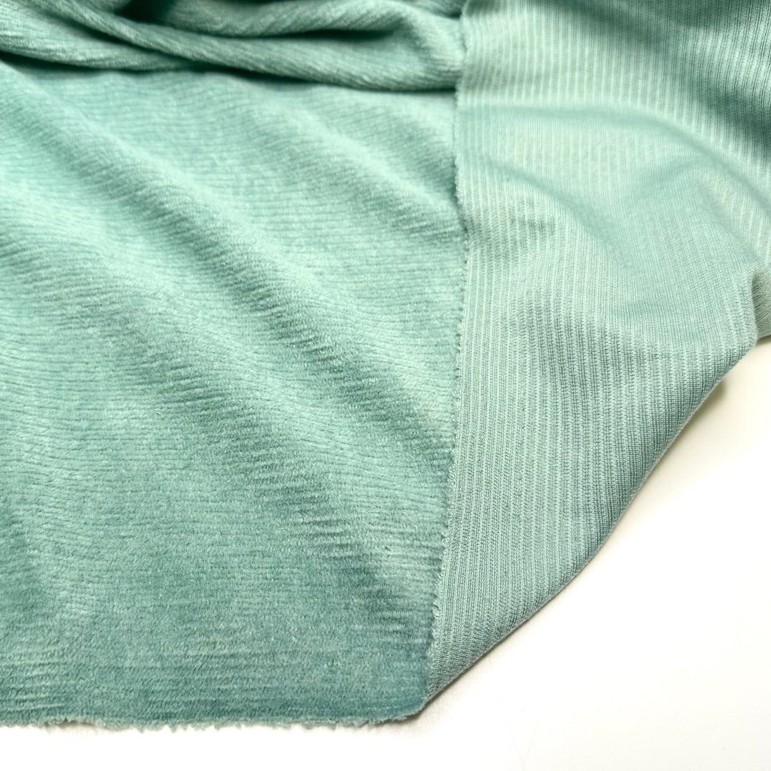 Ghouls Just Want To Have Fun - Corduroy Poly Woven - Light Green/Blue - 1.6M Bundle - True Deadstock fabric Fabric by private - Sustainable Textile | FABCYCLE
