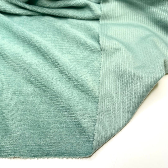 Ghouls Just Want To Have Fun - Corduroy Poly Woven - Light Green/Blue - 1.6M Bundle - True Deadstock fabric Fabric by private - Sustainable Textile | FABCYCLE