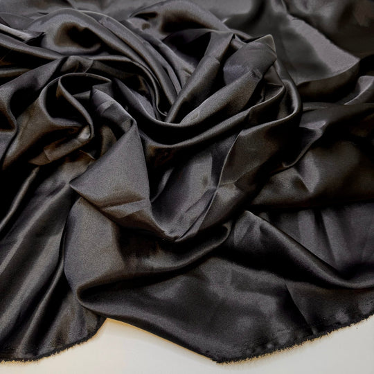Giving Gifts From My Stash - Satin Poly Woven - Black - 1M Bundle - True Deadstock fabric Fabric by private - Sustainable Textile | FABCYCLE