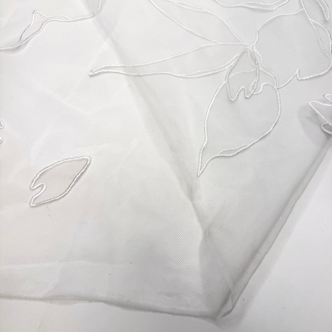 Gliding Across The Dance Floor - Embroidered Tulle Polyester Blend Knit - White Floral - 1M Bundle - True Deadstock fabric Fabric by private - Sustainable Textile | FABCYCLE