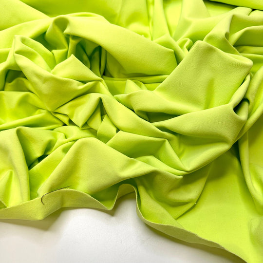 Glowing Teeth - Jersey Poly/Spandex Knit - Bright Neon Green - Bundles - True Deadstock fabric Fabric by private - Sustainable Textile | FABCYCLE