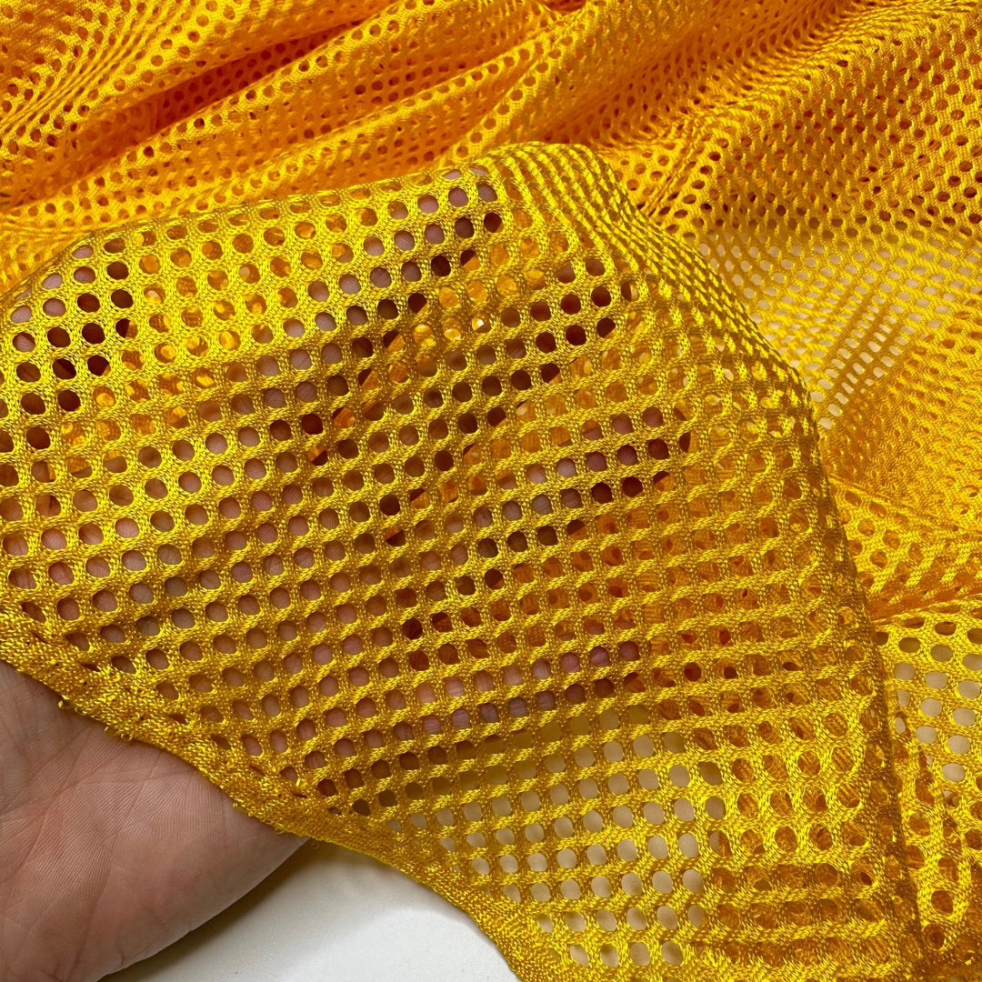 Go For The Gold - Mesh Poly Knit - Yellow - 1M Bundle - True Deadstock fabric Fabric by private - Sustainable Textile | FABCYCLE