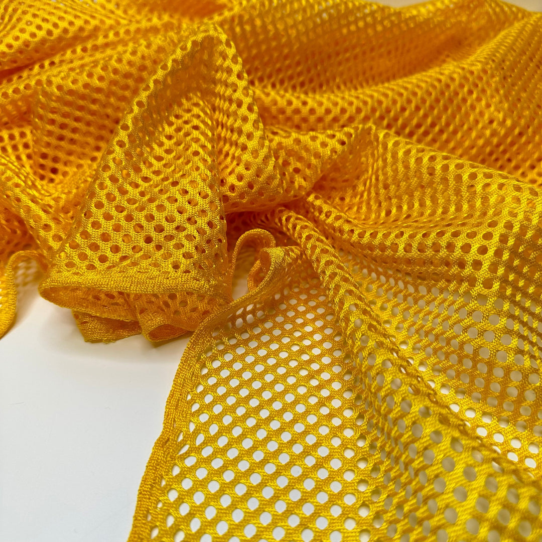 Go For The Gold - Mesh Poly Knit - Yellow - 1M Bundle - True Deadstock fabric Fabric by private - Sustainable Textile | FABCYCLE