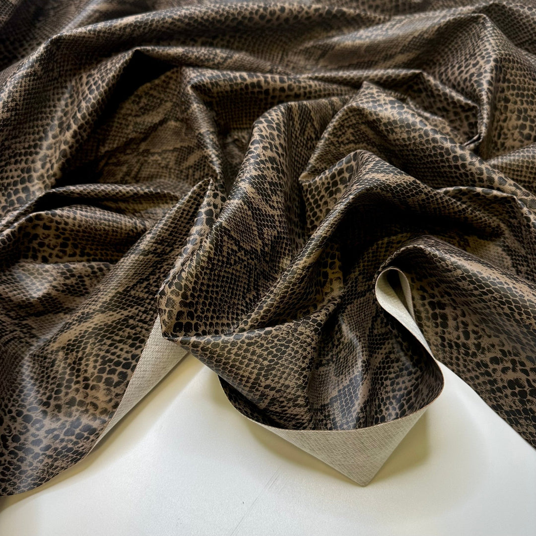 Hiss - Goretex Vinyl PVC Woven - Black/Beige Animal Print - Bundles - True Deadstock fabric Fabric by private - Sustainable Textile | FABCYCLE
