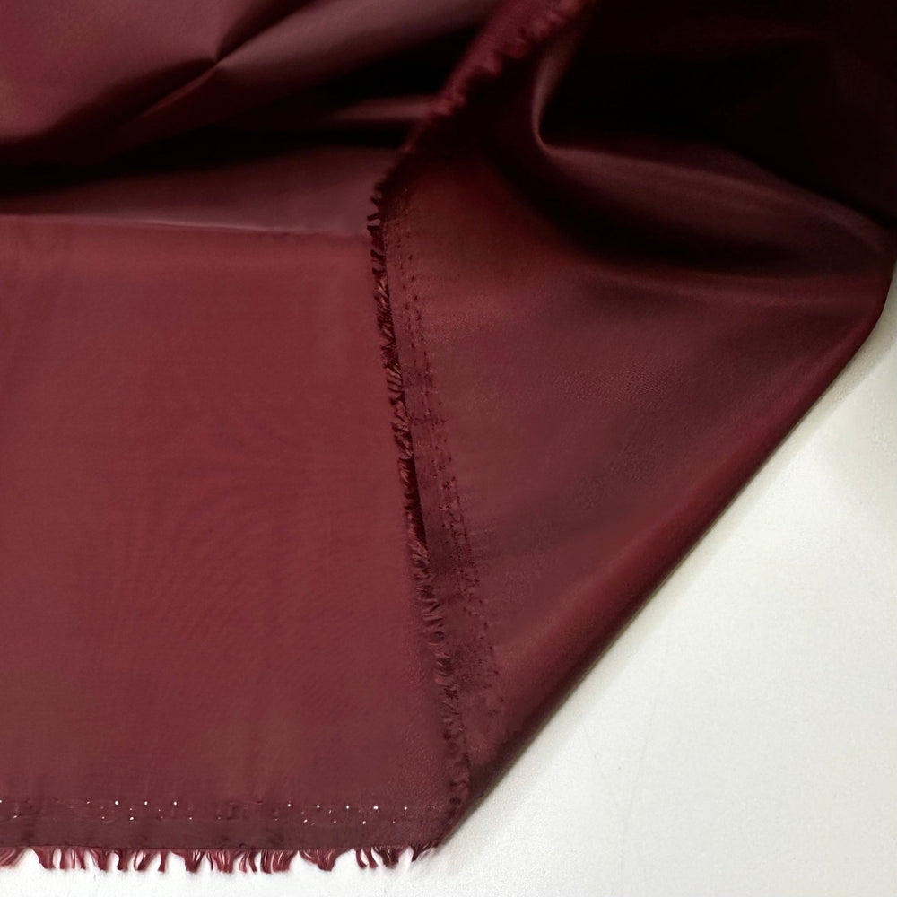 Im Just A Sucker For You - Sateen Polyester Blend Woven - Burgundy - 2.8M Bundle - True Deadstock fabric Fabric by private - Sustainable Textile | FABCYCLE