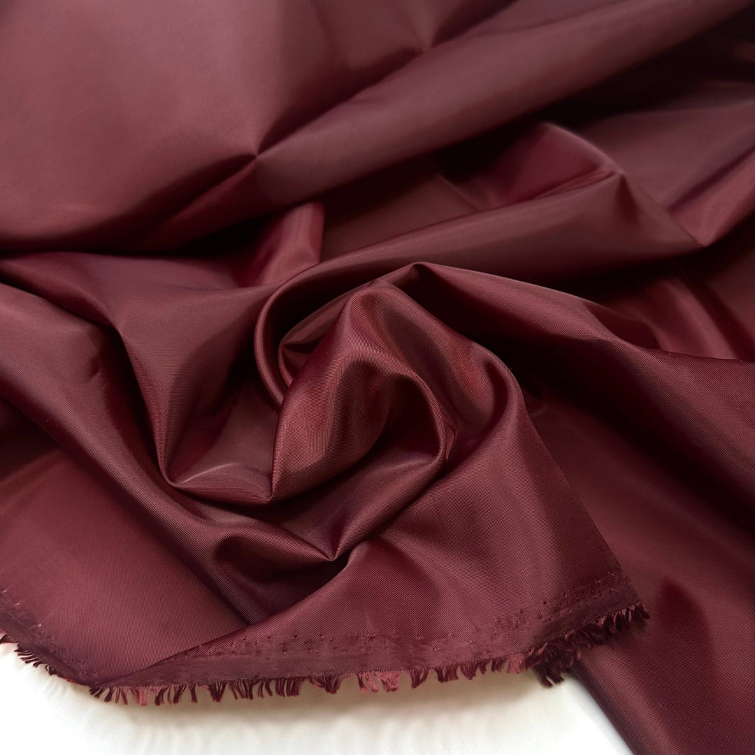 Im Just A Sucker For You - Sateen Polyester Blend Woven - Burgundy - 2.8M Bundle - True Deadstock fabric Fabric by private - Sustainable Textile | FABCYCLE