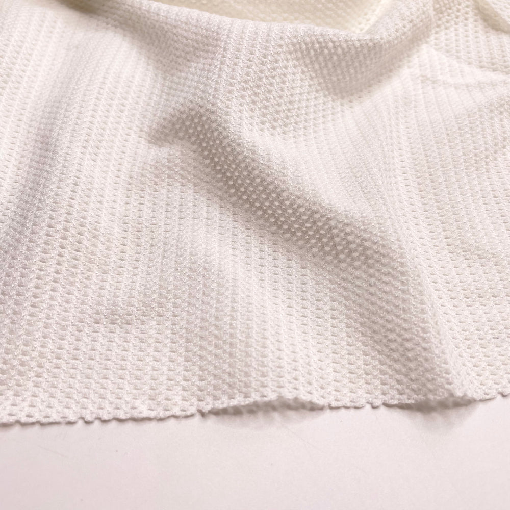 Fork Marks In The Dough - Mesh Nylon/Spandex Knit - Cream - 1M Bundle - FABCYCLE Deadstock and Sustainble Fabrics and Sewing Supplies