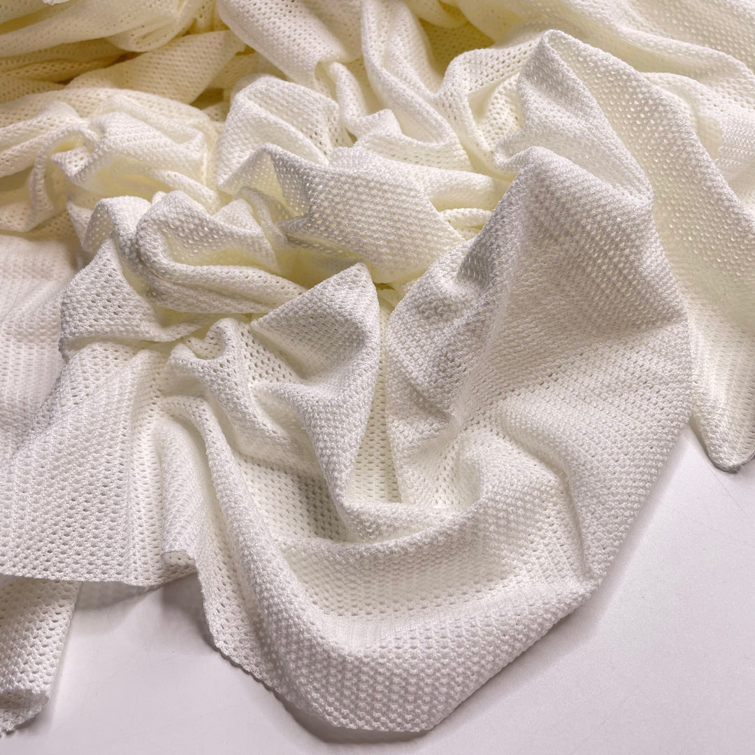Fork Marks In The Dough - Mesh Nylon/Spandex Knit - Cream - 1M Bundle - FABCYCLE Deadstock and Sustainble Fabrics and Sewing Supplies