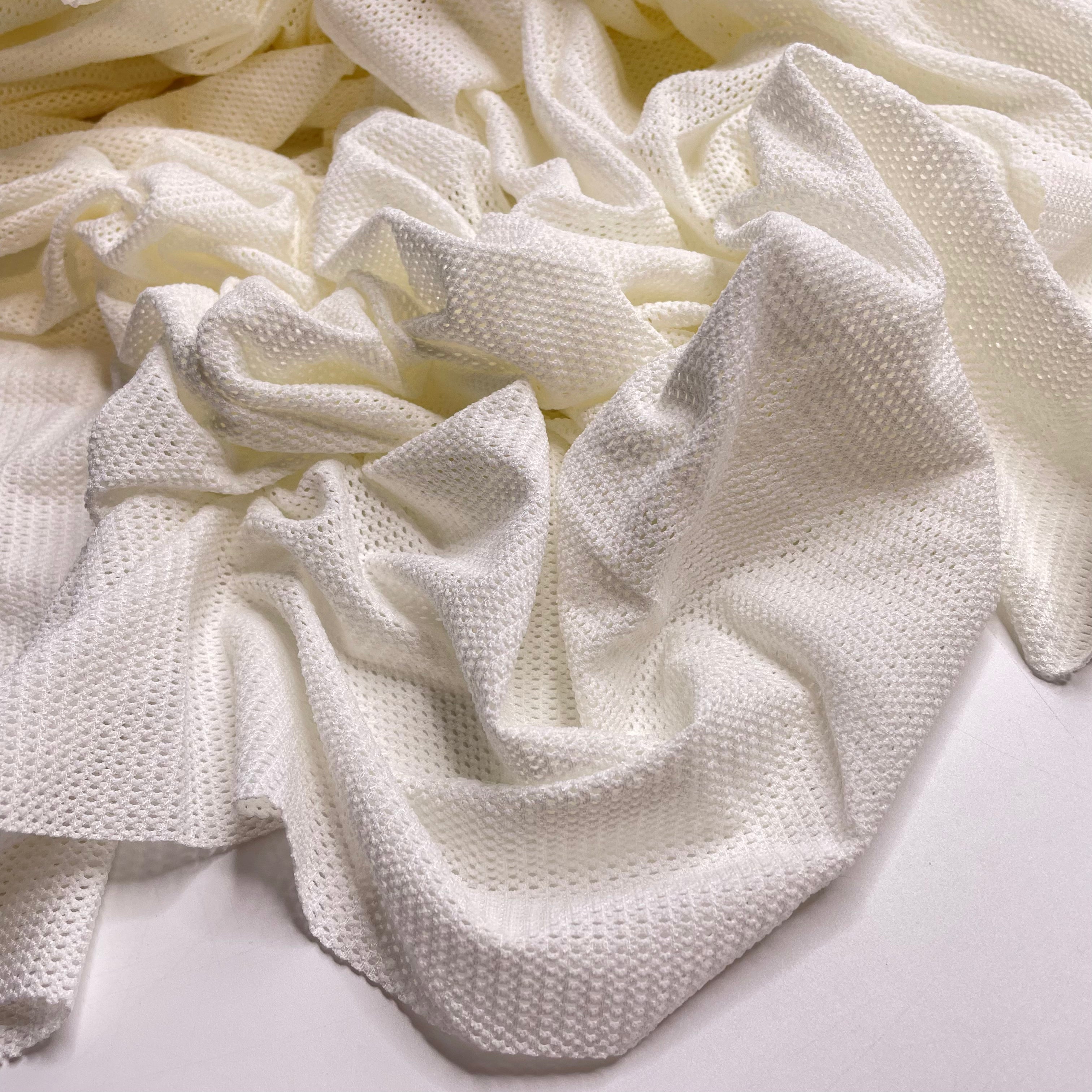 Fork Marks In The Dough - Mesh Nylon/Spandex Knit - Cream - 1M Bundle - FABCYCLE Deadstock and Sustainble Fabrics and Sewing Supplies