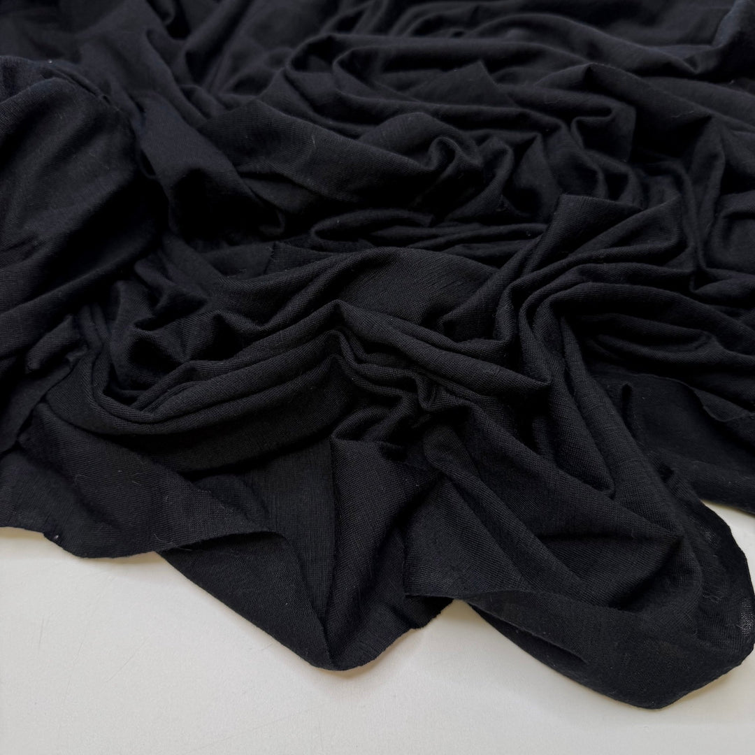 Into The Unknown - Jersey Wool Blend Knit - Black - 1M Bundle - True Deadstock fabric Fabric by private - Sustainable Textile | FABCYCLE