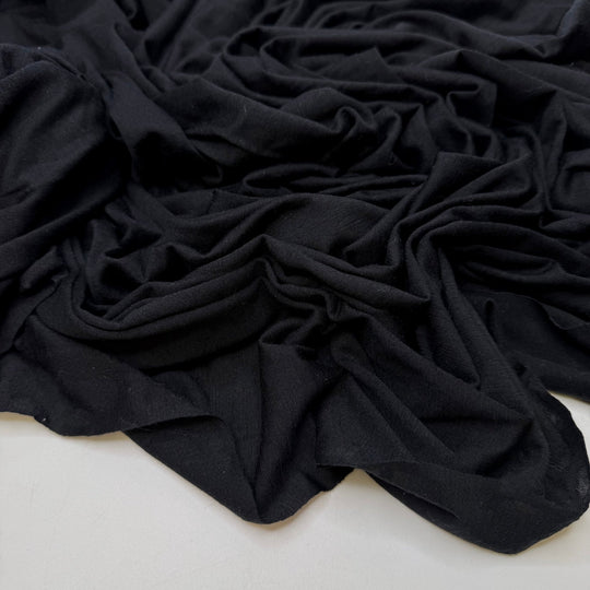 Into The Unknown - Jersey Wool Blend Knit - Black - 1M Bundle - True Deadstock fabric Fabric by private - Sustainable Textile | FABCYCLE
