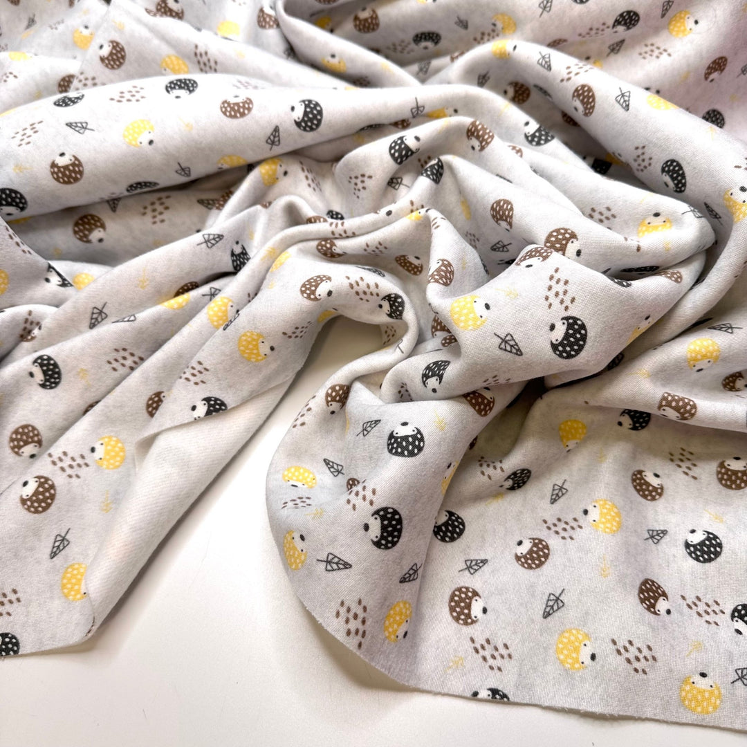 Keeping Critters Out Of The Food - Jersey Fleece Polyester Blend Knit - Light Grey Multi Hedgehogs - 2.1M Bundle - True Deadstock fabric Fabric by private - Sustainable Textile | FABCYCLE