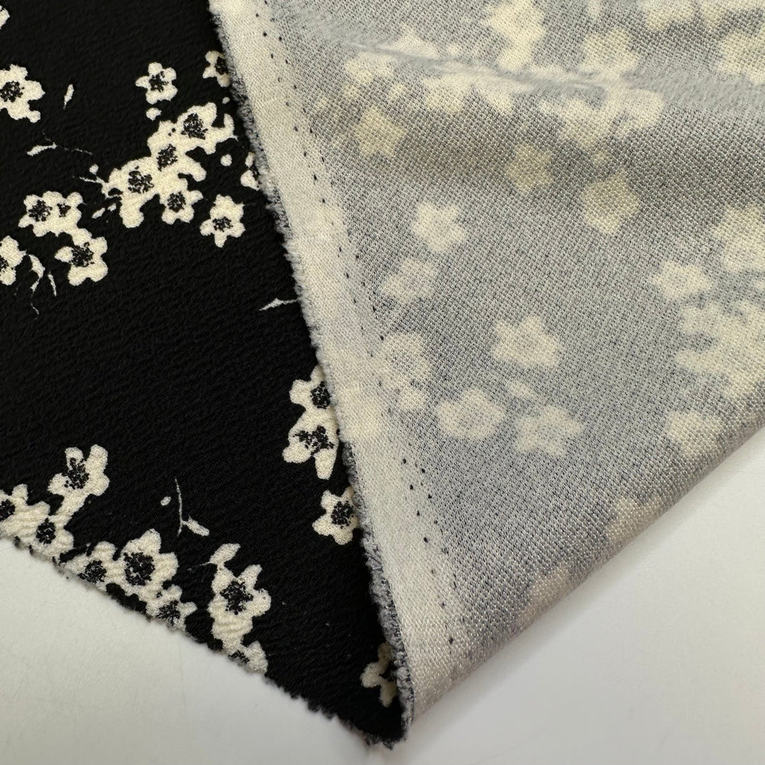 Learning To Forage - Poly Knit - Black/White Floral - 2.6M Bundle - True Deadstock fabric Fabric by private - Sustainable Textile | FABCYCLE