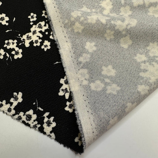 Learning To Forage - Poly Knit - Black/White Floral - 2.6M Bundle - True Deadstock fabric Fabric by private - Sustainable Textile | FABCYCLE