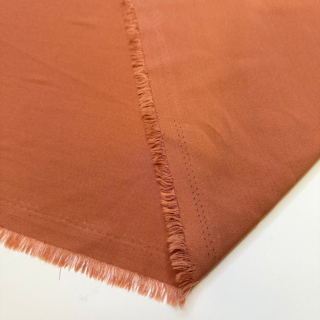 Let The Festive Season Begin - Sateen Polyester Blend Woven - Light Orange - 2M Bundle - True Deadstock fabric Fabric by private - Sustainable Textile | FABCYCLE