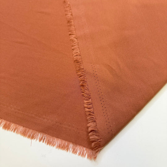 Let The Festive Season Begin - Sateen Polyester Blend Woven - Light Orange - 2M Bundle - True Deadstock fabric Fabric by private - Sustainable Textile | FABCYCLE