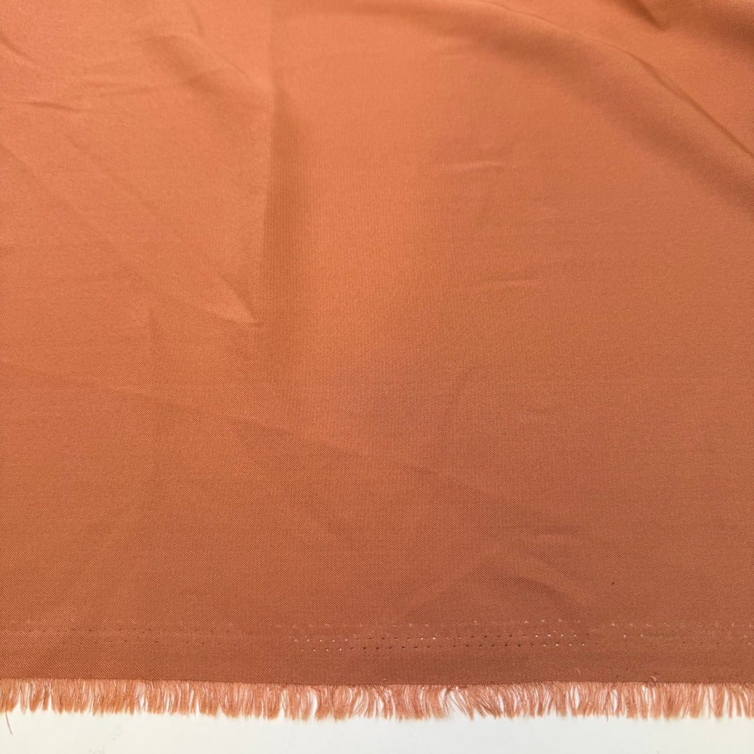 Let The Festive Season Begin - Sateen Polyester Blend Woven - Light Orange - 2M Bundle - True Deadstock fabric Fabric by private - Sustainable Textile | FABCYCLE