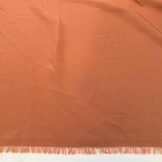 Let The Festive Season Begin - Sateen Polyester Blend Woven - Light Orange - 2M Bundle - True Deadstock fabric Fabric by private - Sustainable Textile | FABCYCLE
