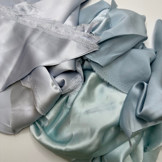 Light Of The Moon - Off Cuts Satin Silk Woven - Light Blue - 0.5 Lb Bag - True Deadstock fabric Fabric by private - Sustainable Textile | FABCYCLE