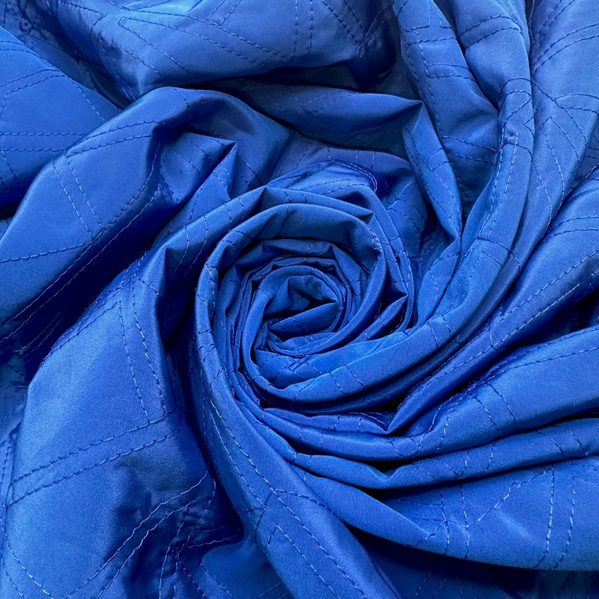 Managing My Adult Money - Quilted Top Satin Polyester Blend Woven - Blue Abstract - Bundles - True Deadstock fabric Fabric by private - Sustainable Textile | FABCYCLE