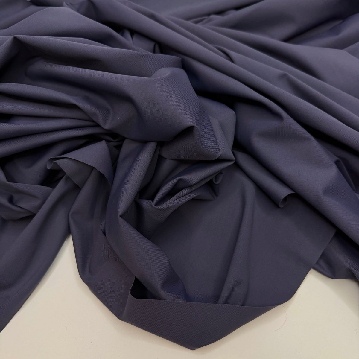 Mountains That Reach The Clouds - Poly/Spandex Knit - Navy - 1M Bundle - True Deadstock fabric Fabric by private - Sustainable Textile | FABCYCLE