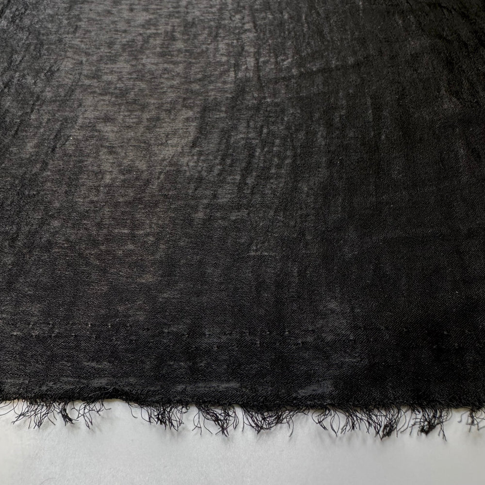 Mysterious Figure - Polyester Blend Woven - Black - Bundles - True Deadstock fabric Fabric by private - Sustainable Textile | FABCYCLE