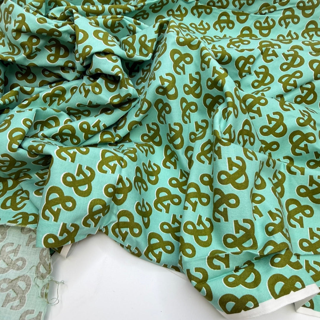Needles And Thread And Scissors And - Organic Cotton Woven - Green/Teal Ampersand - 0.9M Bundle - True Deadstock fabric Fabric by private - Sustainable Textile | FABCYCLE