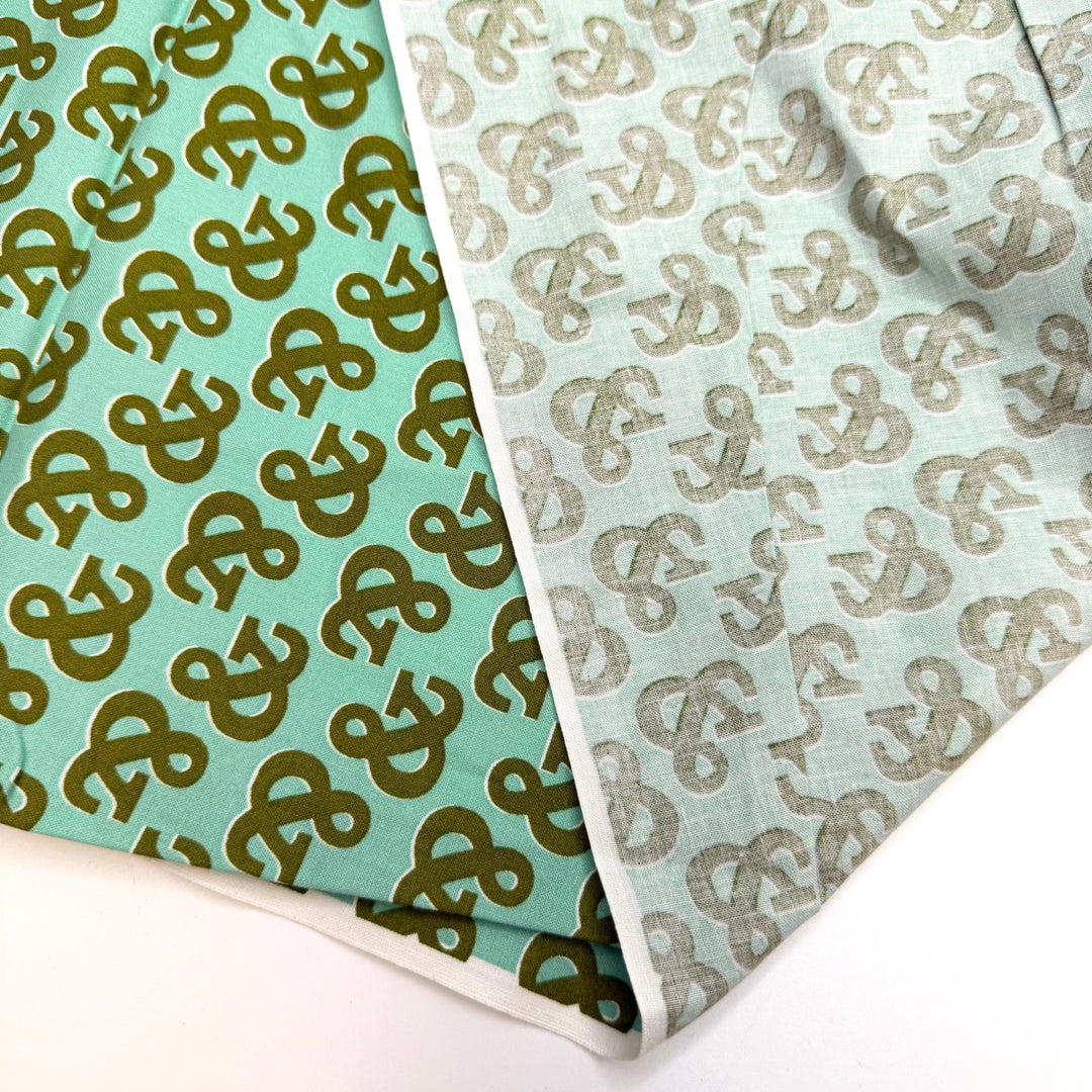 Needles And Thread And Scissors And - Organic Cotton Woven - Green/Teal Ampersand - 0.9M Bundle - True Deadstock fabric Fabric by private - Sustainable Textile | FABCYCLE
