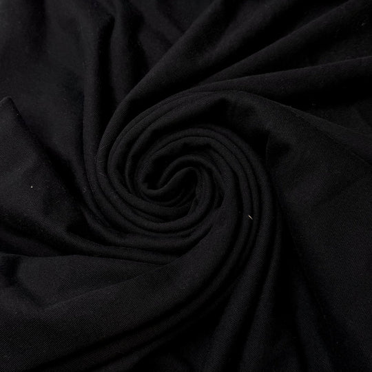 Nestled In The Bushes - Tubular Rib Knit Cotton Blend Knit - Black - 2M Bundle - True Deadstock fabric Fabric by private - Sustainable Textile | FABCYCLE
