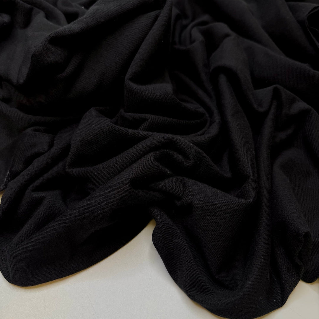 Nestled In The Bushes - Tubular Rib Knit Cotton Blend Knit - Black - 2M Bundle - True Deadstock fabric Fabric by private - Sustainable Textile | FABCYCLE
