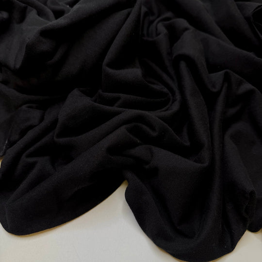 Nestled In The Bushes - Tubular Rib Knit Cotton Blend Knit - Black - 2M Bundle - True Deadstock fabric Fabric by private - Sustainable Textile | FABCYCLE