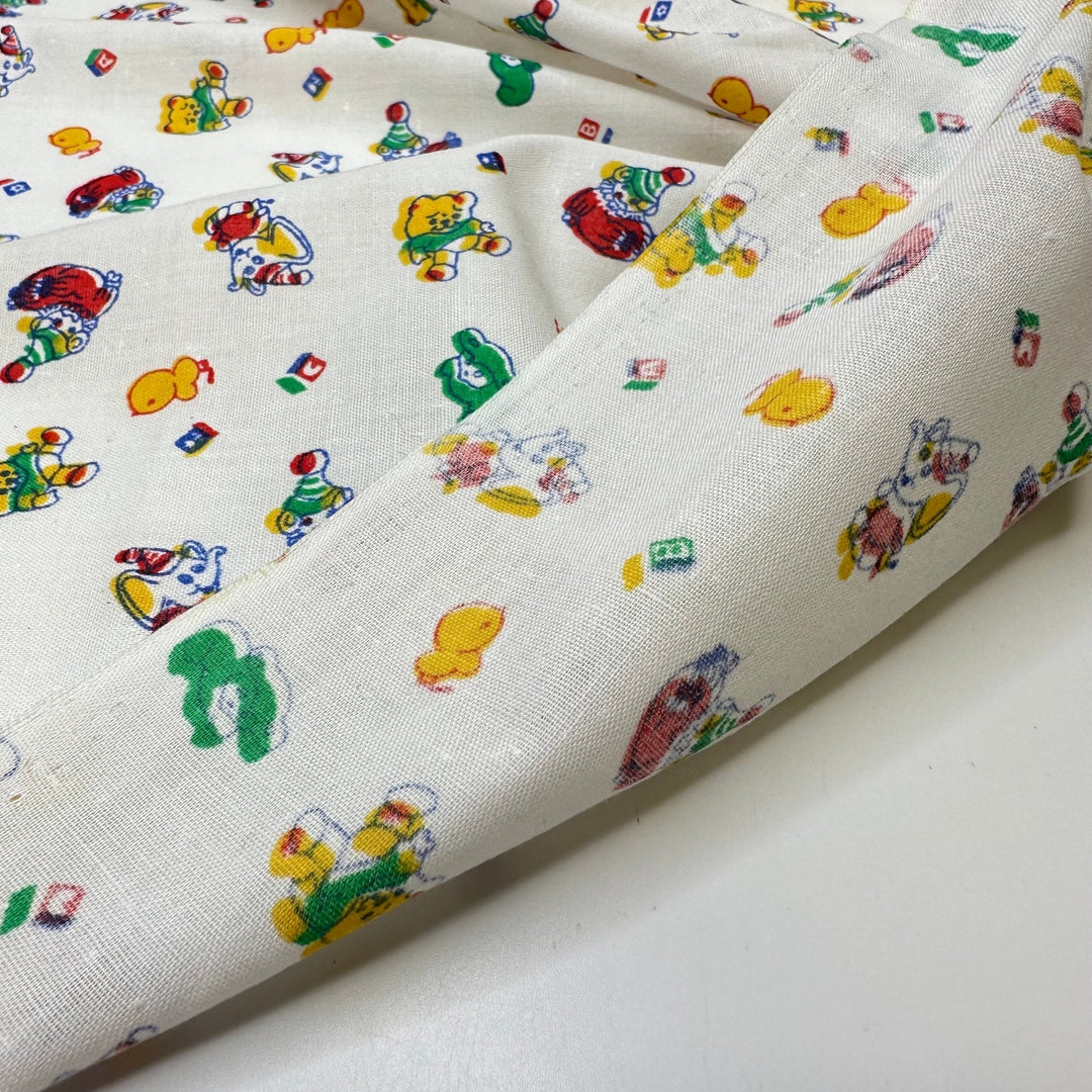 New Member Of The Family - Vintage Cotton Woven - White Multi Kids Motif - 2.15M Bundle - True Deadstock fabric Fabric by private - Sustainable Textile | FABCYCLE
