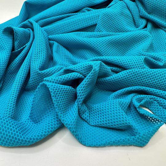 Peacocks In The Pool - Sport Mesh Poly/Spandex Knit - Aqua Blue - 1.9M Bundle - True Deadstock fabric Fabric by private - Sustainable Textile | FABCYCLE