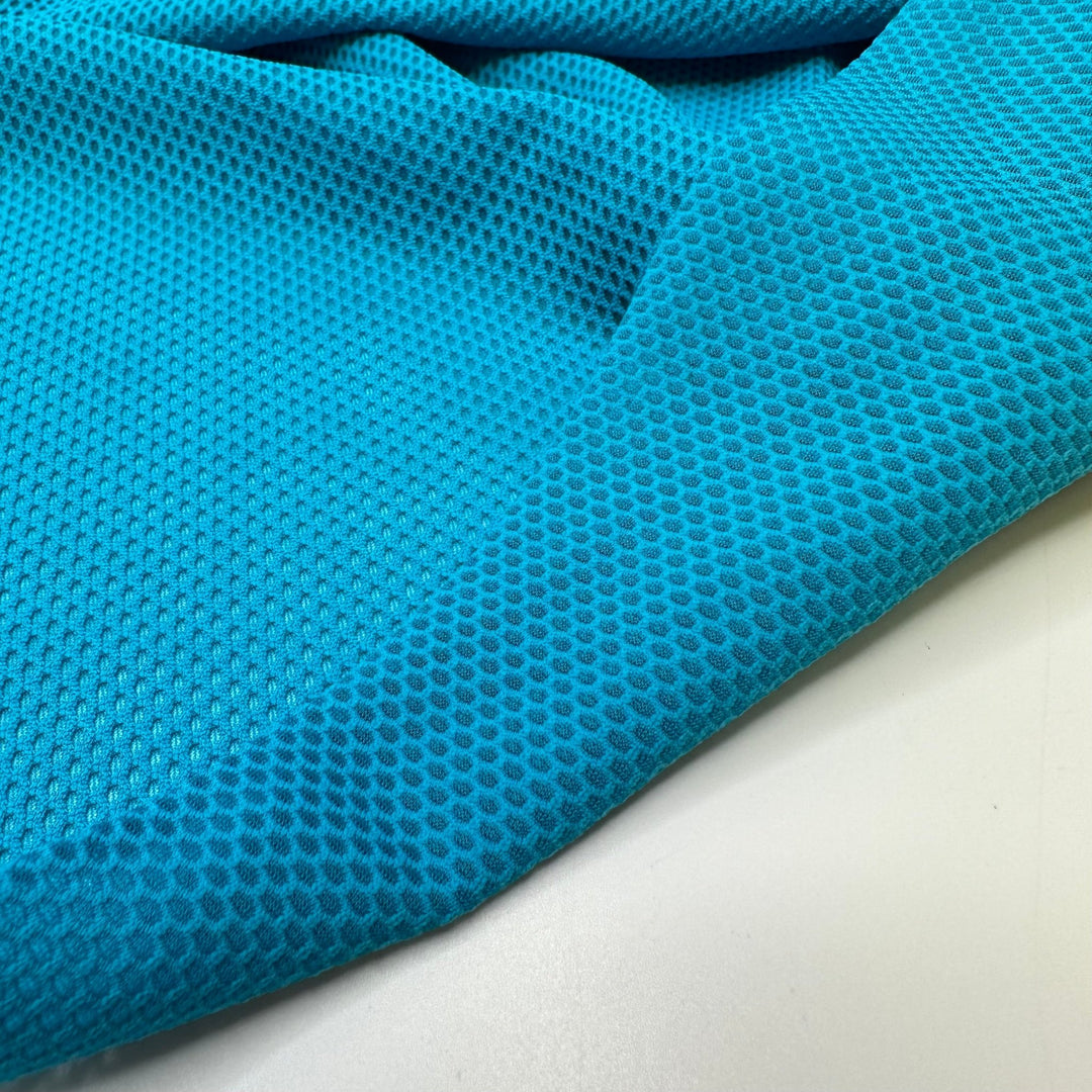 Peacocks In The Pool - Sport Mesh Poly/Spandex Knit - Aqua Blue - 1.9M Bundle - True Deadstock fabric Fabric by private - Sustainable Textile | FABCYCLE