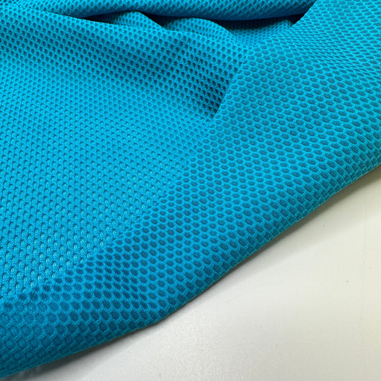 Peacocks In The Pool - Sport Mesh Poly/Spandex Knit - Aqua Blue - 1.9M Bundle - True Deadstock fabric Fabric by private - Sustainable Textile | FABCYCLE