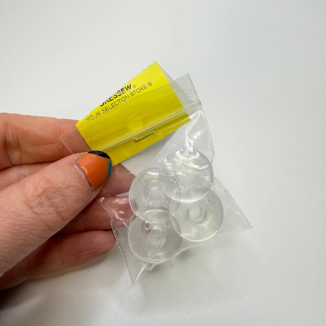 Plastic Bobbins Notions - Clear - 4 Pack - True Deadstock supplies Fabric by private - Sustainable Textile | FABCYCLE
