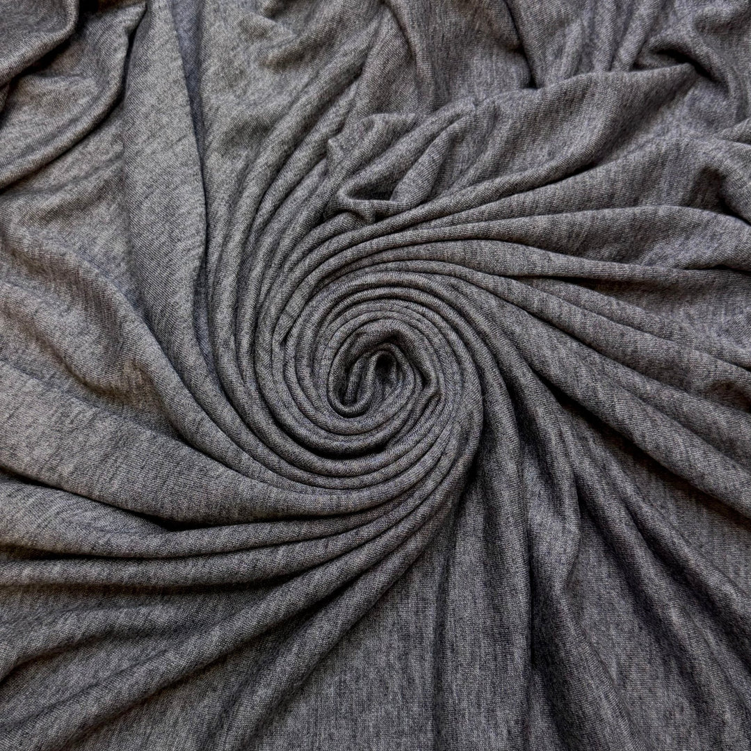 Poised To Change Lives - Jersey Wool Blend Knit - Grey - 1.65M Bundle - True Deadstock fabric Fabric by private - Sustainable Textile | FABCYCLE