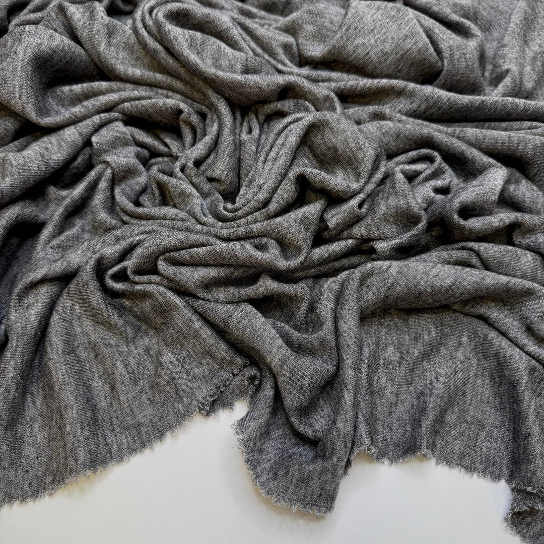Poised To Change Lives - Jersey Wool Blend Knit - Grey - 1.65M Bundle - True Deadstock fabric Fabric by private - Sustainable Textile | FABCYCLE