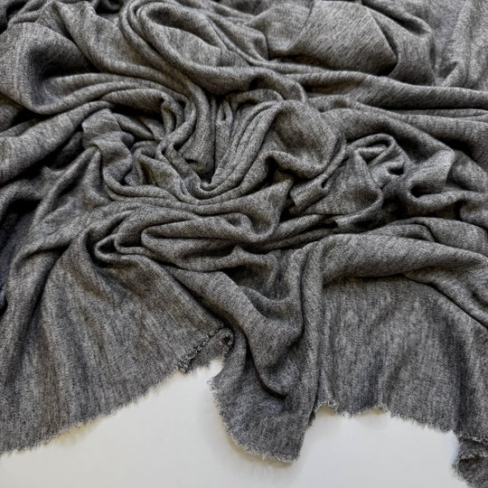 Poised To Change Lives - Jersey Wool Blend Knit - Grey - 1.65M Bundle - True Deadstock fabric Fabric by private - Sustainable Textile | FABCYCLE